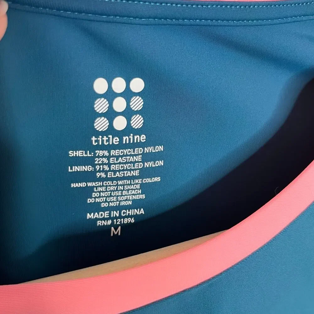Title Nine Tideturn Cropped Rash Guard Womens M Blue Green Pink Colorblock